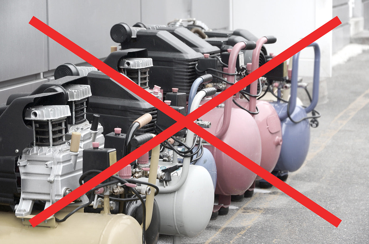 A row of conventional air compressors crossed out with a red X