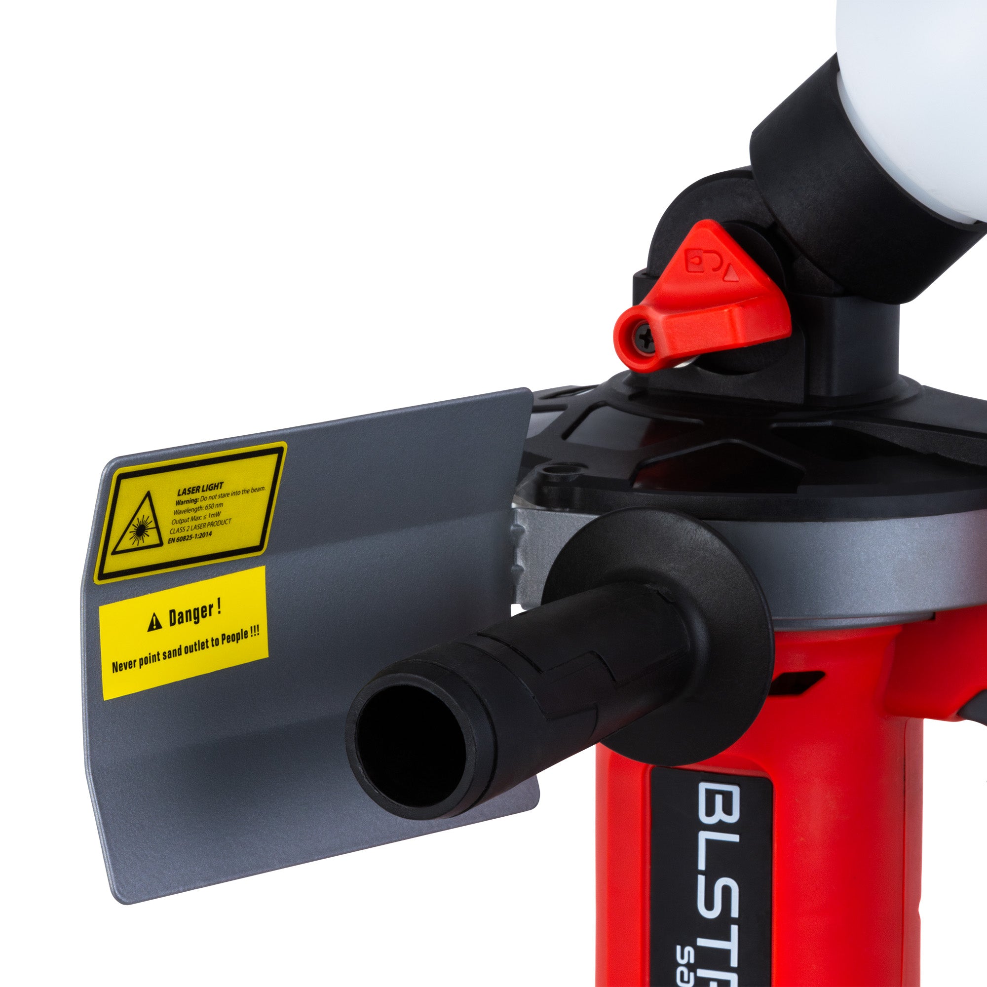 The BLSTR sander's blast shield and sand outlet, showing the laser-safety and 'never point sand outlet at people' warning labels